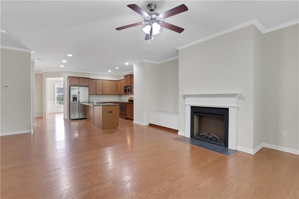 1300 Hopkins Drive Decatur, GA 30033 - Photo 9 of 30 a view of a kitchen with a sink and a fireplace
