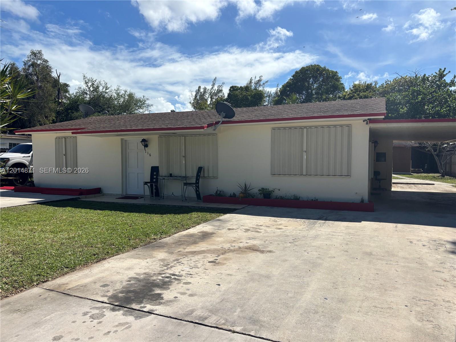 116 Allen Road West Park, FL 33023 - Photo 1 of 15 a view of a backyard