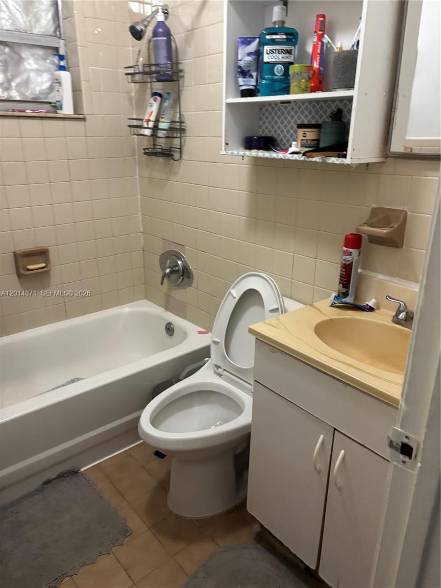 116 Allen Road West Park, FL 33023 - Photo 13 of 15 a bathroom with a sink and a mirror