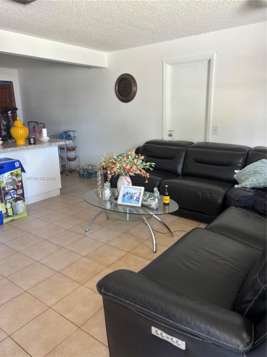 116 Allen Road West Park, FL 33023 - Photo 9 of 15 a room with furniture and a mirror