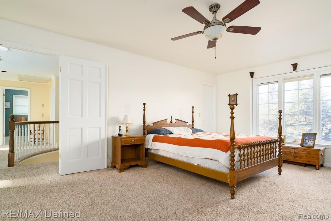 1935 Independence Drive Rochester, MI 48306 - Photo 17 of 30 Light Filled Master Bedroom with His and Hers Walk in Closets