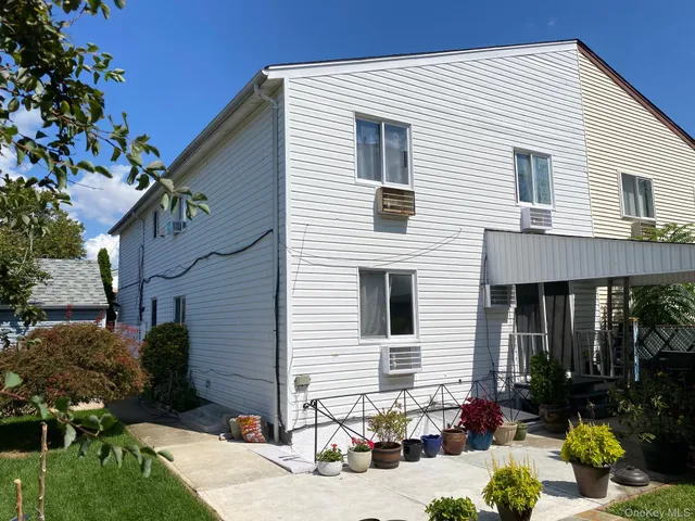 a view of a house with a patio