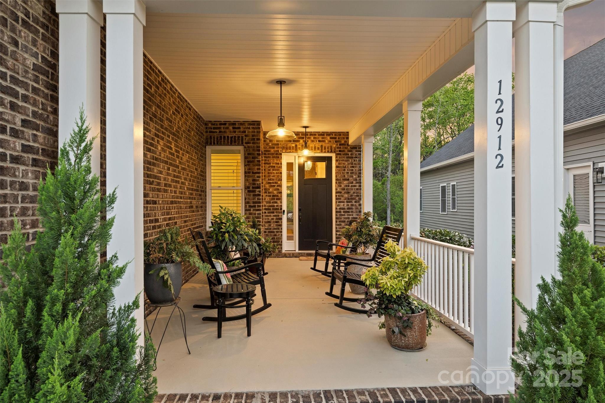 12912 Bailey Road Cornelius, NC 28031 - Photo 2 of 27 a dining room with furniture and chandelier