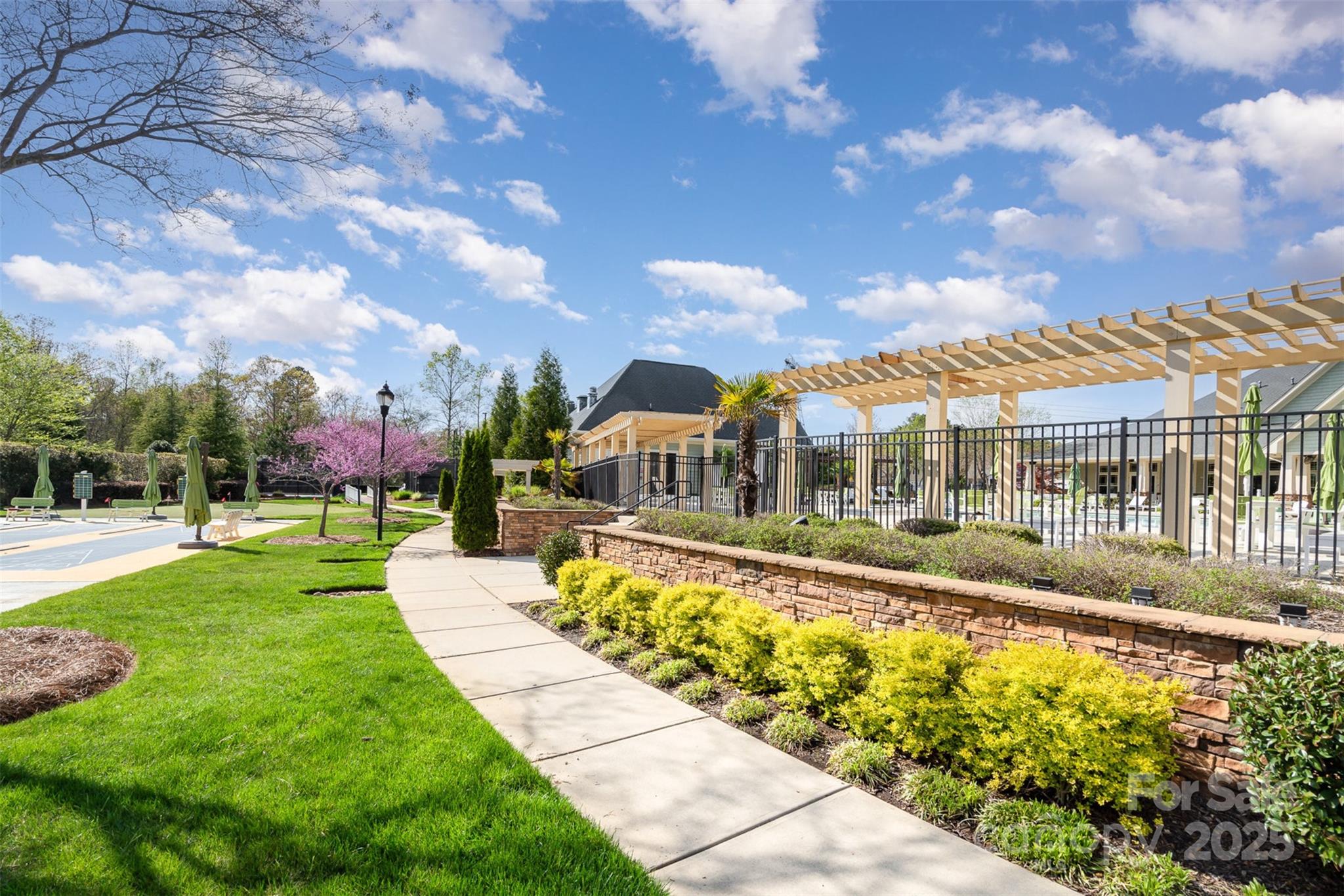 12912 Bailey Road Cornelius, NC 28031 - Photo 27 of 27 a view of a house with a garden