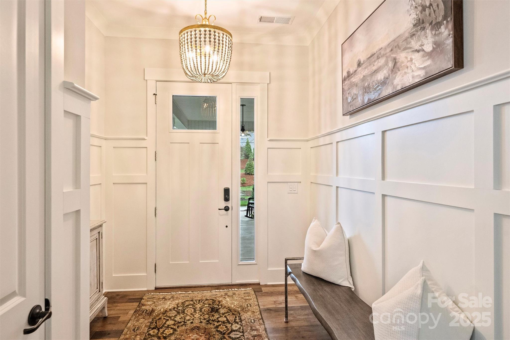 12912 Bailey Road Cornelius, NC 28031 - Photo 3 of 27 a view of an entryway with wooden floor