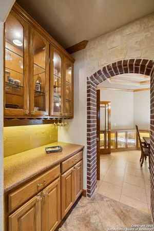 a kitchen with a sink and cabinets