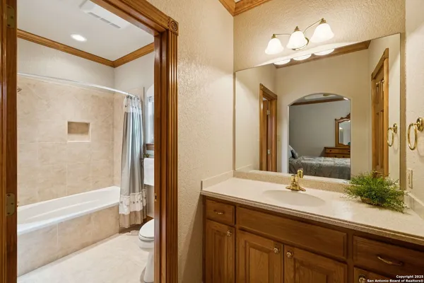 a bathroom with a sink double vanity and a mirror
