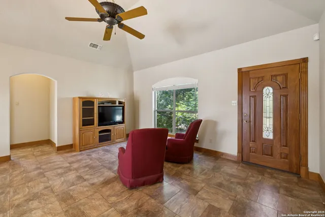 a workspace with furniture window and a kitchen