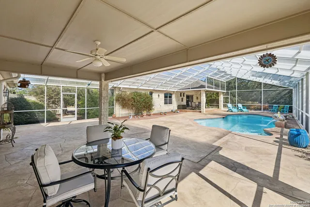 a view of a patio with couches table and chairs