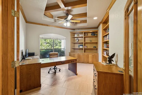 a view of a workspace with furniture