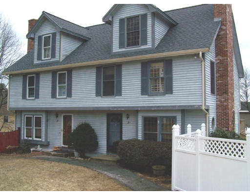 5 R Gayle Drive Derry, NH 03038 - Photo 1 of 1 a view of a brick house with many windows