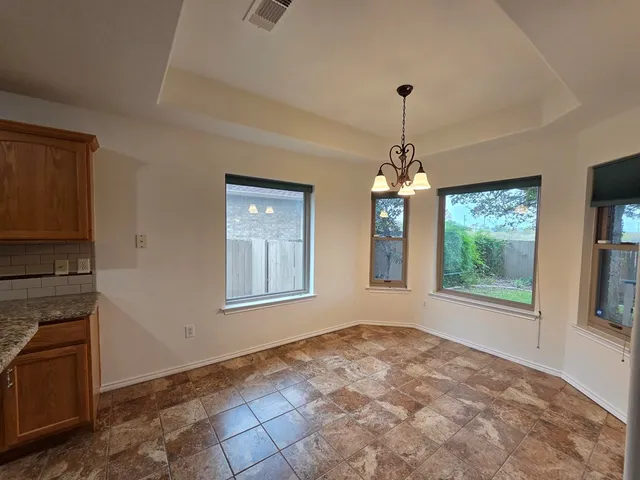 a window in an empty room with windows