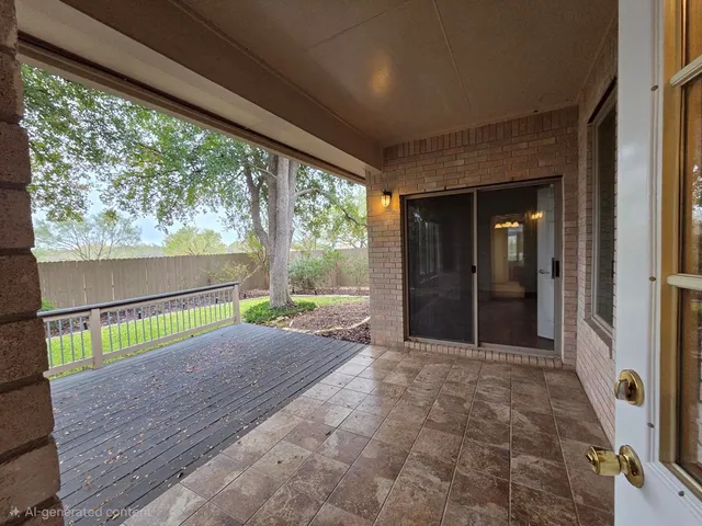 a view of porch with a floor to ceiling window next to a yard