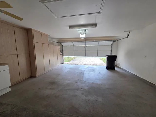 a view of balcony with wooden floor