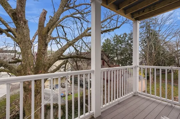 a view of a wooden roof deck