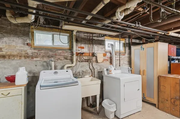 a utility room with dryer and washer