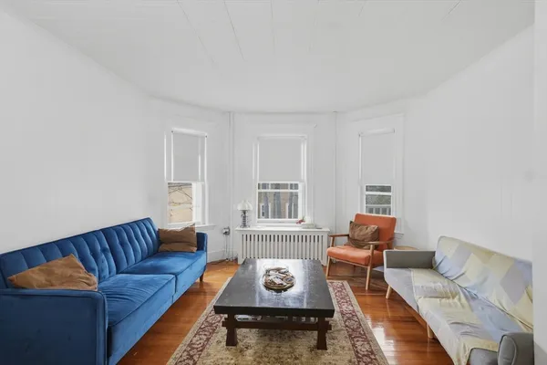 a living room with furniture and a couch