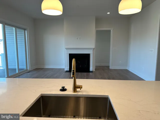 a bathroom with a double vanity sink and mirror
