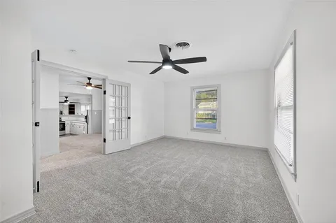 a kitchen with stainless steel appliances a stove and a refrigerator
