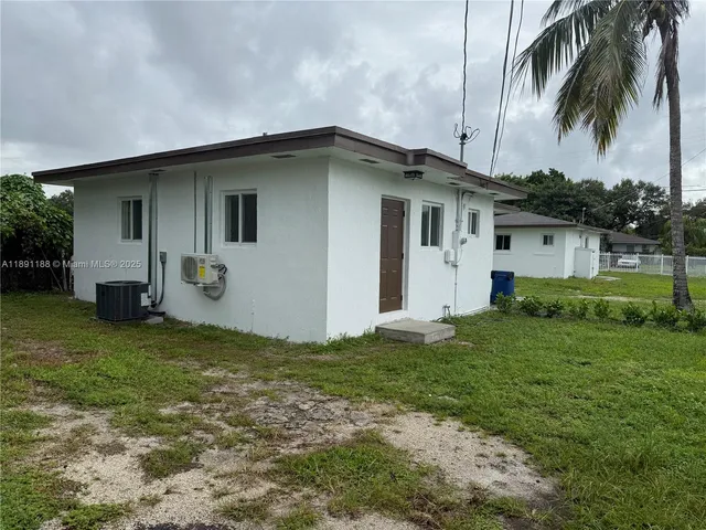 a house view with a garden space