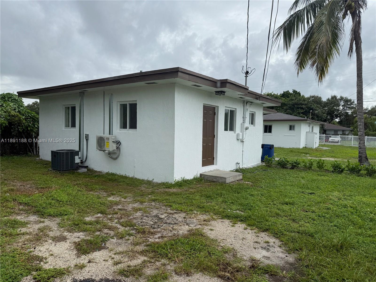 a house view with a garden space