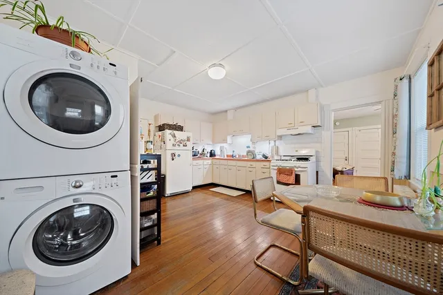 a view of a living room and dining room