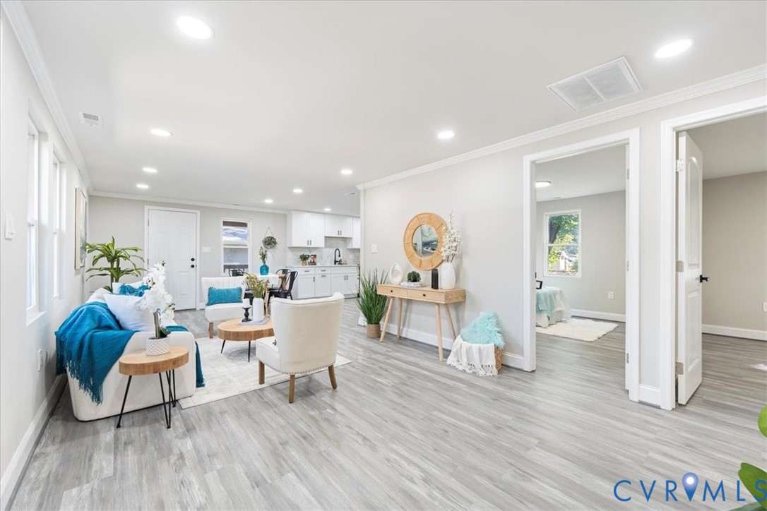 1701 Arlington Road Hopewell, VA 23860 - Photo 14 of 29 a living room with furniture and a wooden floor