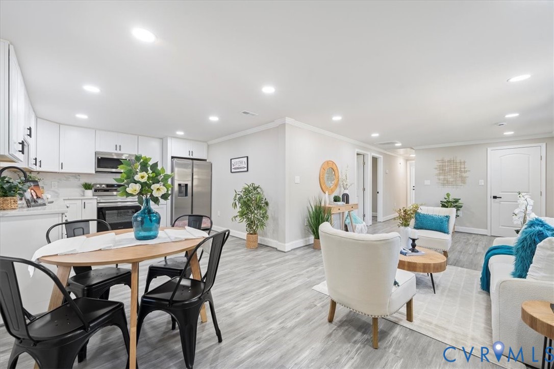 1701 Arlington Road Hopewell, VA 23860 - Photo 17 of 29 a view of a dining room with furniture window and wooden floor