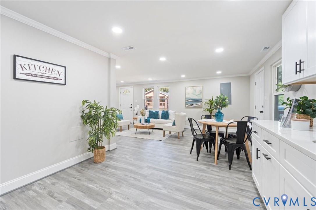 1701 Arlington Road Hopewell, VA 23860 - Photo 19 of 29 a view of a dining room with furniture and wooden floor