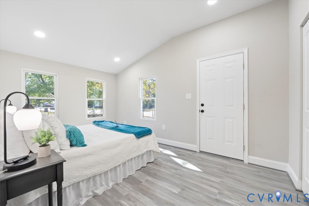 1701 Arlington Road Hopewell, VA 23860 - Photo 26 of 29 a bedroom with a bed and a table