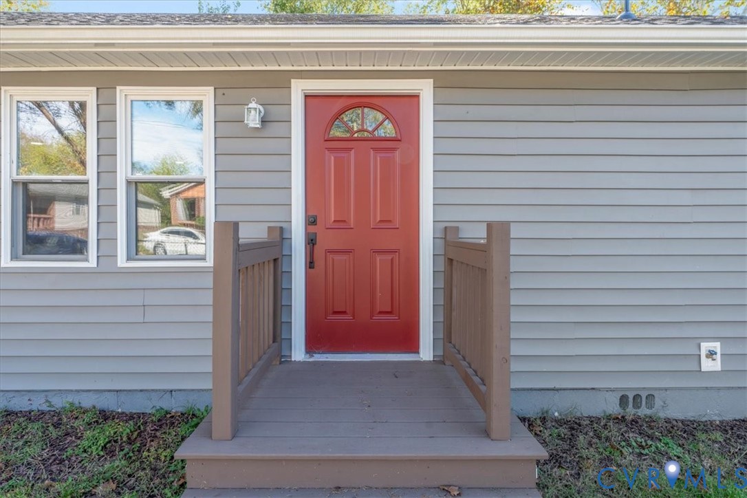 1701 Arlington Road Hopewell, VA 23860 - Photo 7 of 29 a view of entrance gate of the house and front view of a house