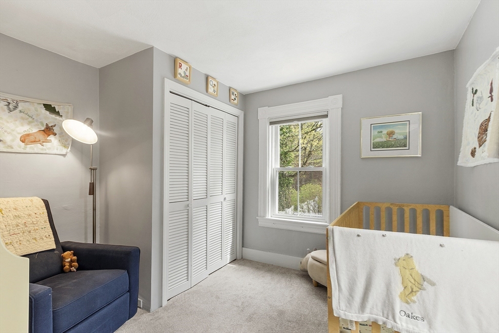 210 Bedford Street Concord, MA 01742 - Photo 25 of 40 a living room with furniture and a window