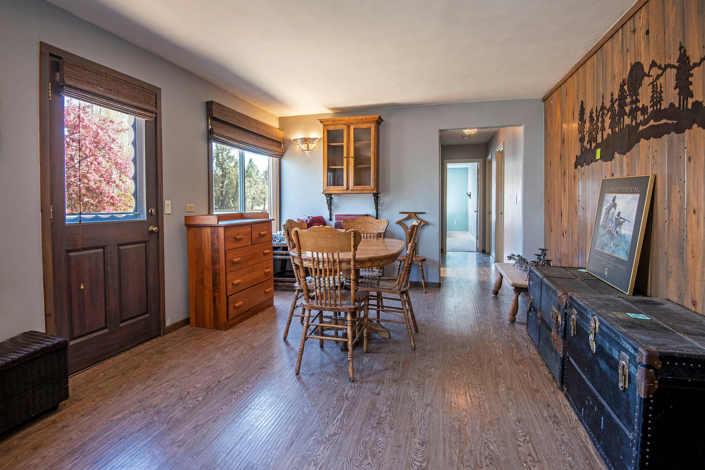 63591 Gentry Loop Bend, OR 97701 - Photo 7 of 24 a dining room with furniture window and wooden floor