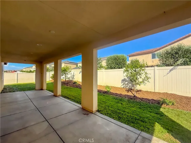 a view of porch with a yard