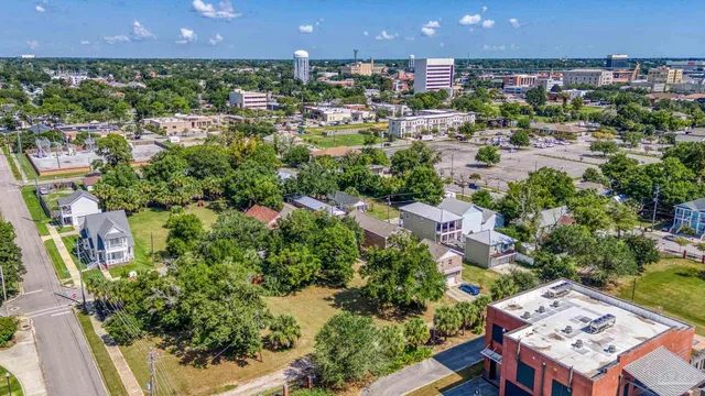 a view of a city and swimming pool
