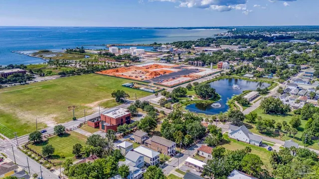 an aerial view of residential houses with outdoor space