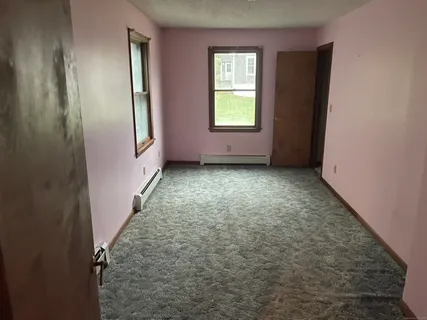 an empty room with windows