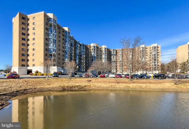 a view of a large building with a lake view