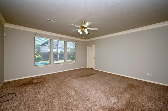 a bathroom with a bathtub shower sink vanity and mirror