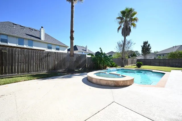 a view of a garden with a tree