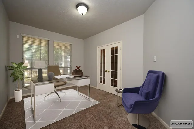 an empty room with windows