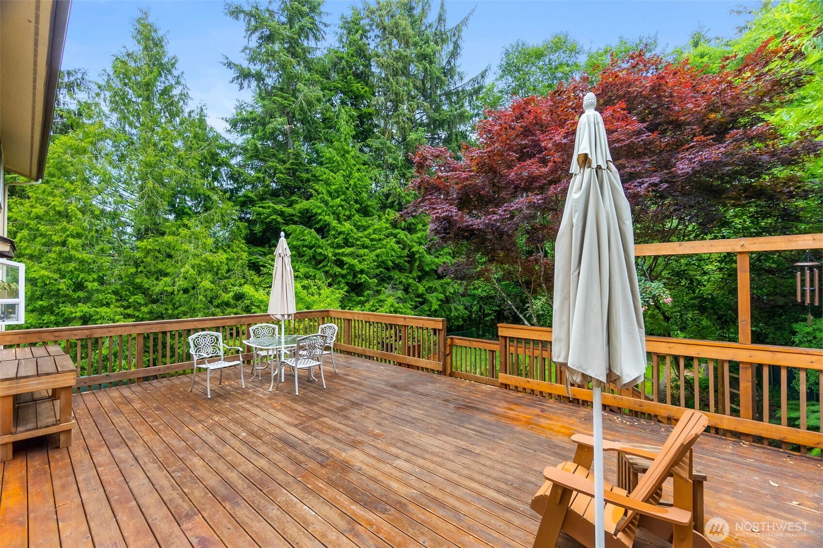 711 Purkey Avenue Aberdeen, WA 98520 - Photo 14 of 39 a view of a chairs and table on the wooden deck
