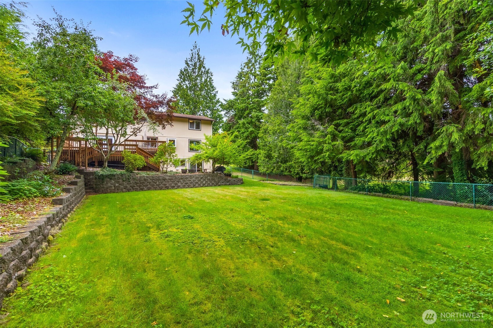 711 Purkey Avenue Aberdeen, WA 98520 - Photo 18 of 39 a view of a yard with a house in the background