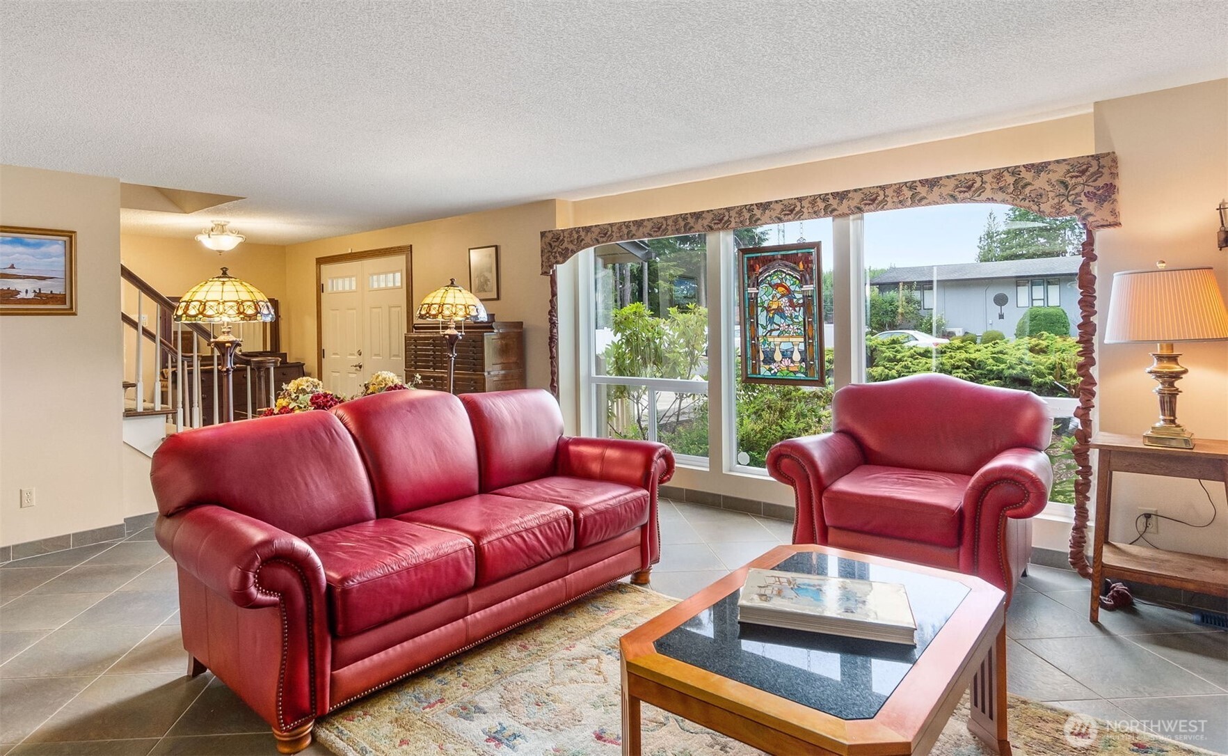 711 Purkey Avenue Aberdeen, WA 98520 - Photo 5 of 39 a living room with furniture and a large window