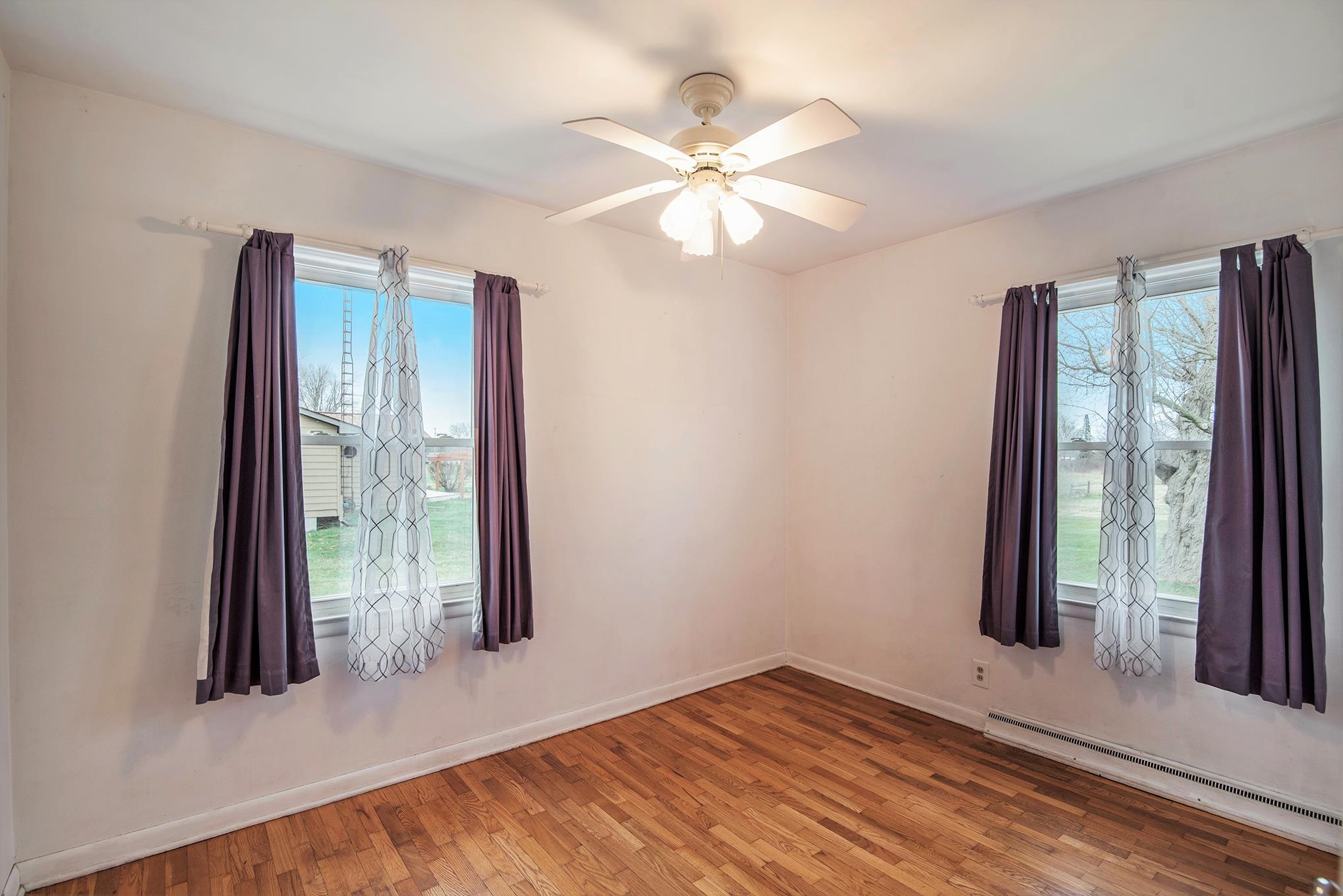 4436 Reid Road Swartz Creek, MI 48473 - Photo 11 of 30 One of 2 Main Floor Bedrooms