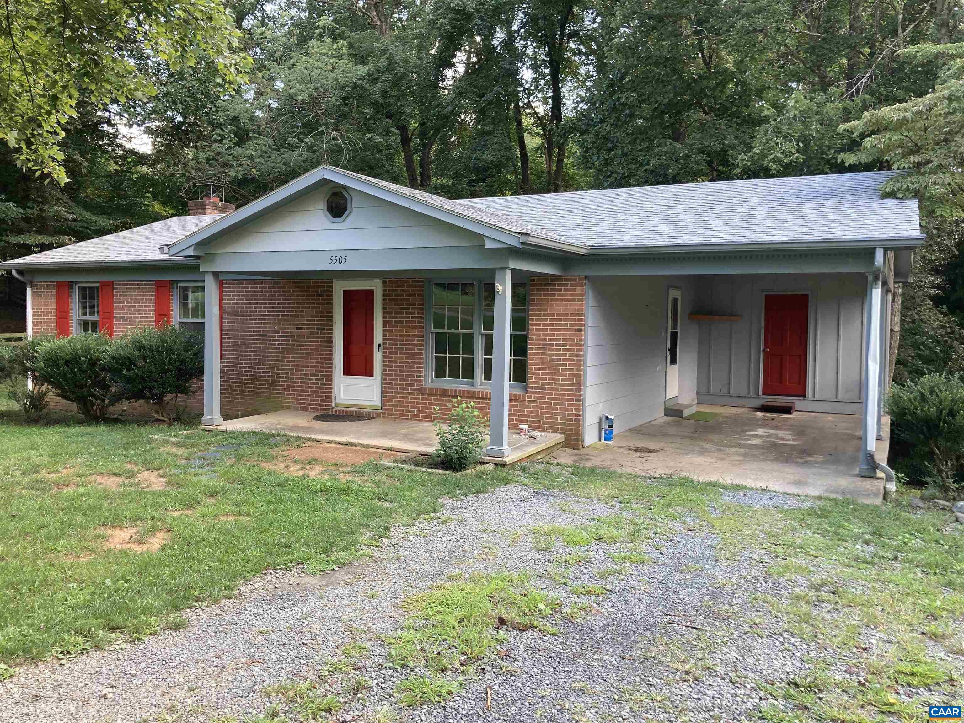 5505 Jamestown Road Crozet, VA 22932 - Photo 1 of 1 a front view of a house with yard and garage
