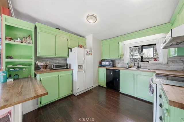 a living room with furniture and a clock