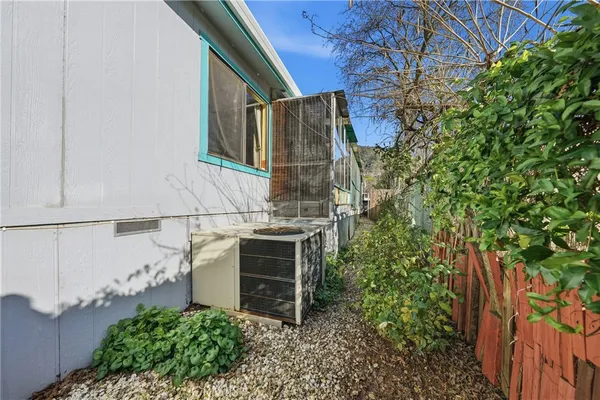 a view of a backyard of the house