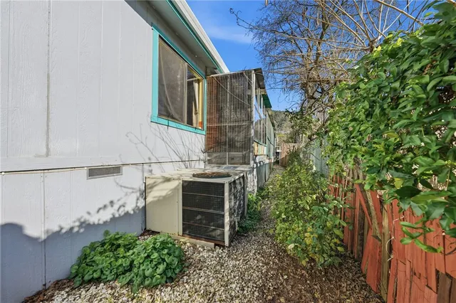 a view of a backyard of the house