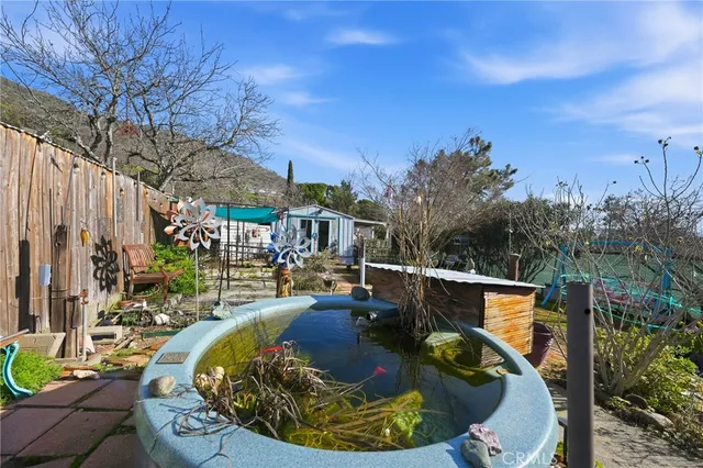 a house view with a backyard space
